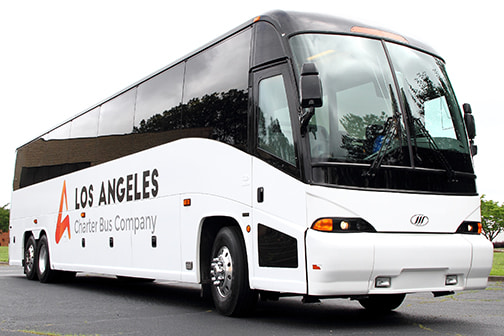 a plain white charter bus with a 